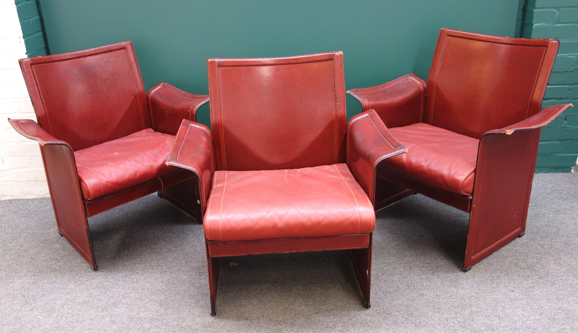 Appraisal: A set of three th century Italian rouge leather upholstered