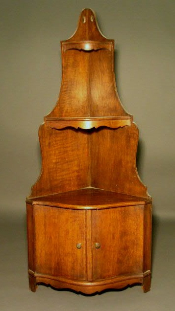 Appraisal: Mahogany three tiered what-not-shelf h x w x d