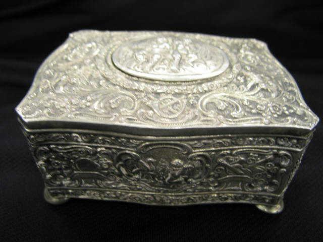 Appraisal: Mechanical Bird Music Box with Ornate sterling silver case decorated