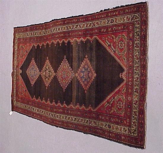 Appraisal: Antique Persian Malayer rug four red medallion on brown ground