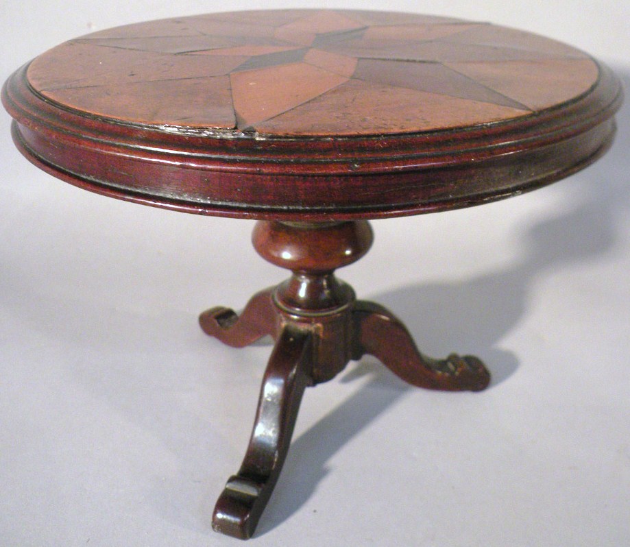 Appraisal: A thC miniature mahogany and parquetry tilt top table the