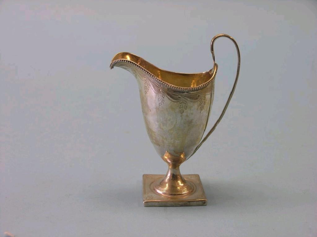 Appraisal: A George III silver cream jug by Peter and Ann