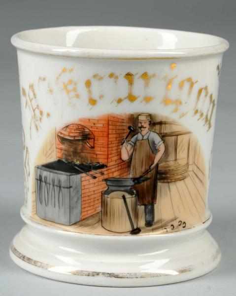 Appraisal: Blacksmith Shaving Mug Description Nice image of blacksmith working with