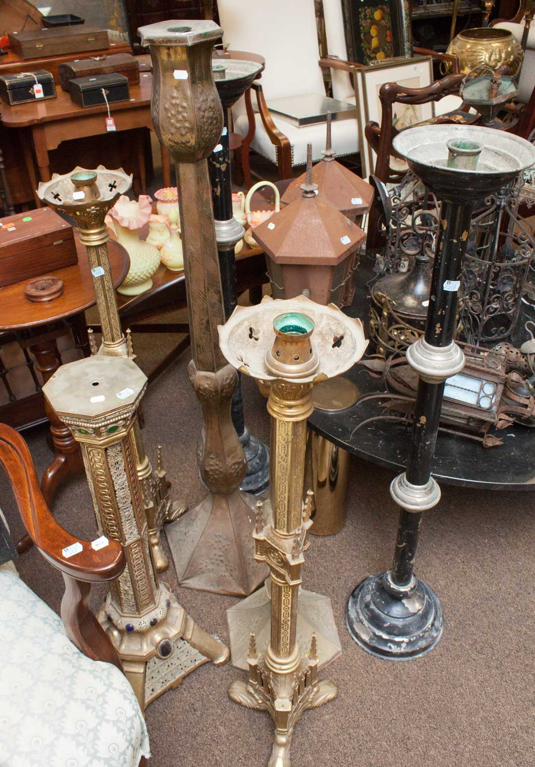 Appraisal: Six candle stands and a metal base