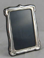 Appraisal: A silver faced photo frame Birmingham x cm