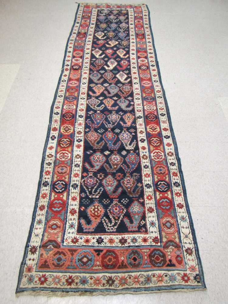 Appraisal: SEMI-ANTIQUE PERSIAN TRIBAL RUNNER Hamadan region northwestern Iran extra large