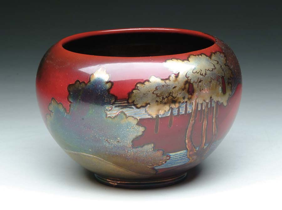 Appraisal: ZSOLNAY SCENIC BOWL Outstanding Zsolnay bowl has red sunburst background