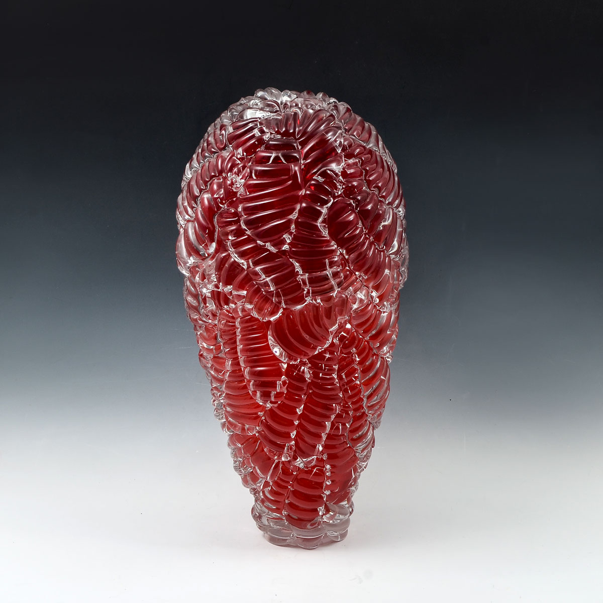 Appraisal: LARGE MARIEL WADDELL HUNTER RED GLASS VASE Heavy thick glass