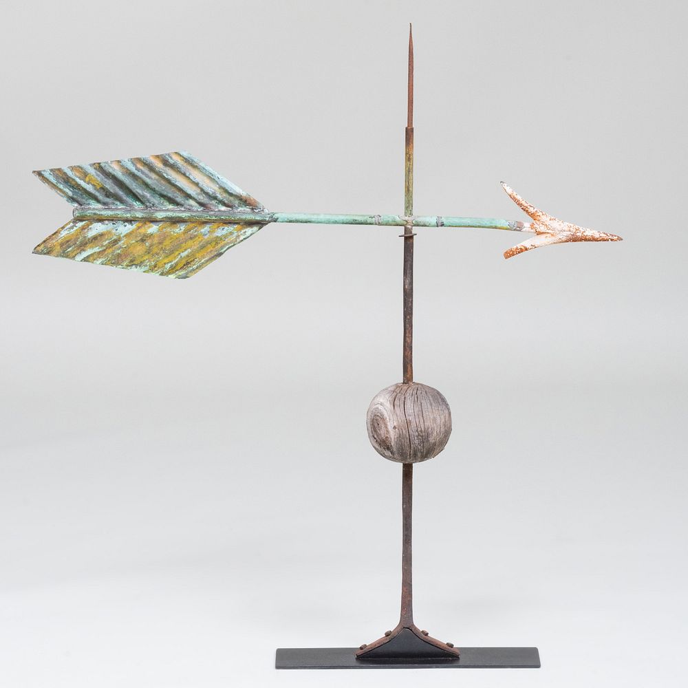 Appraisal: Arrow Form Metal and Wood Weathervane Raised on a stand