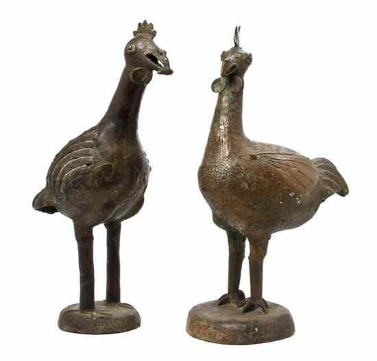 Appraisal: A Pair of African Style Cast Metal Birds each in