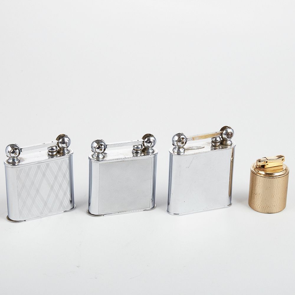 Appraisal: Grp European Chromium Plated Table Lighters Group of four European