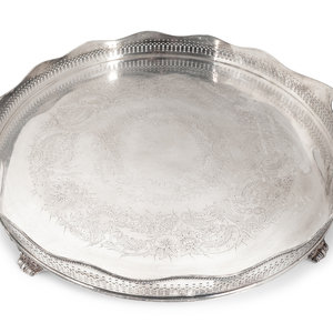 Appraisal: An English Silverplate Two-Handled Galleried and Footed Circular Tray Height