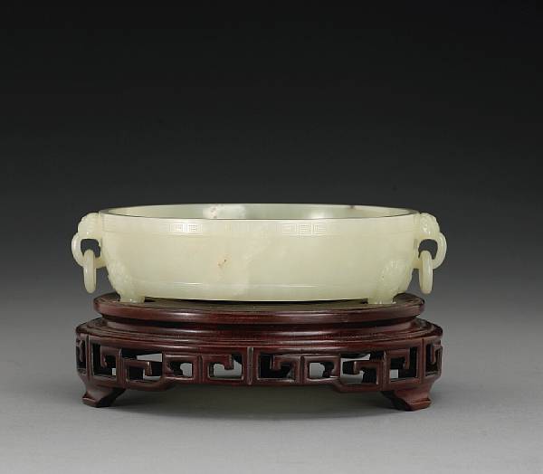 Appraisal: A white jade basin th Century Its thinly cut walls