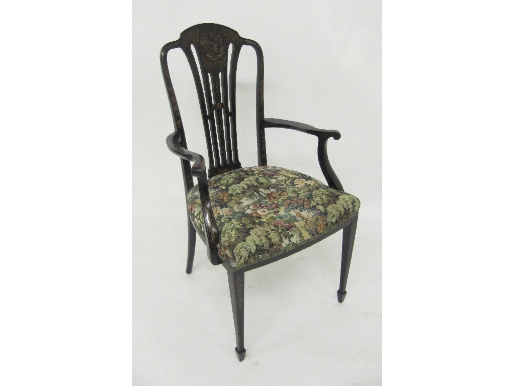 Appraisal: An Edwardian japanned elbow chair richly decorated with gilt floral