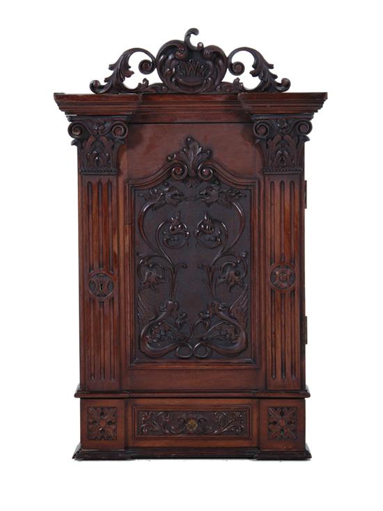 Appraisal: Continental carved mahogany hanging corner cabinet late th century H