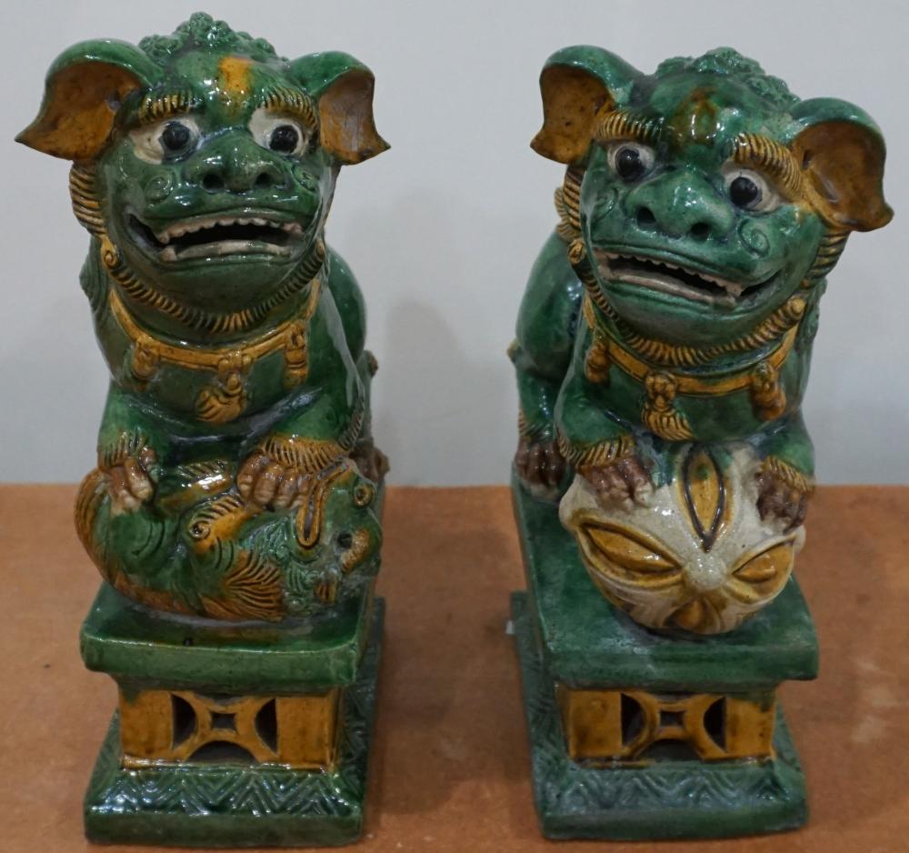 Appraisal: PAIR CHINESE SANCAI GLAZED FOO DOGSPair Chinese Sancai Glazed Foo