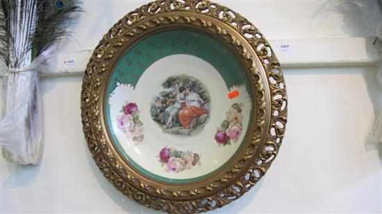 Appraisal: A VIENNA STYLE PORCELAIN PLAQUE WITHIN A GILTWOOD FRAME Circular