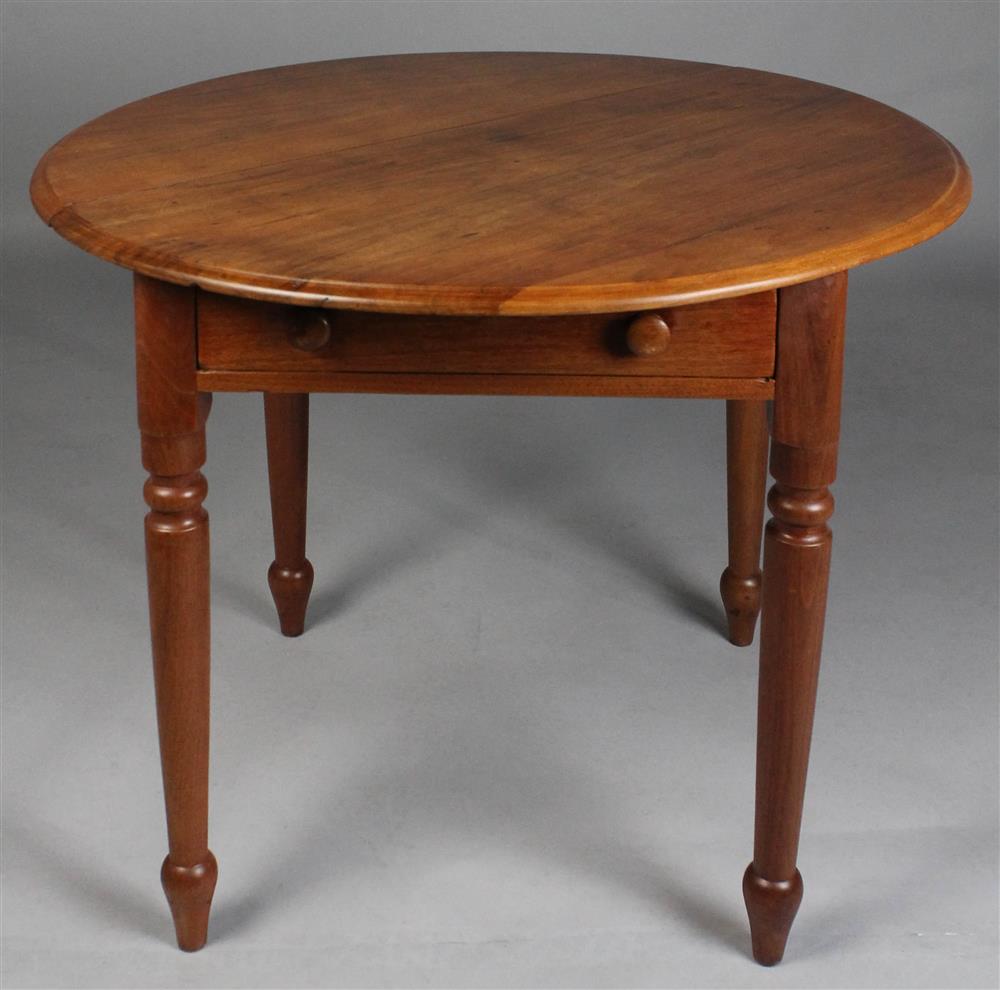 Appraisal: CIRCULAR MAHOGANY TAVERN TABLE WITH ONE DRAWER AND TURNED LEGS