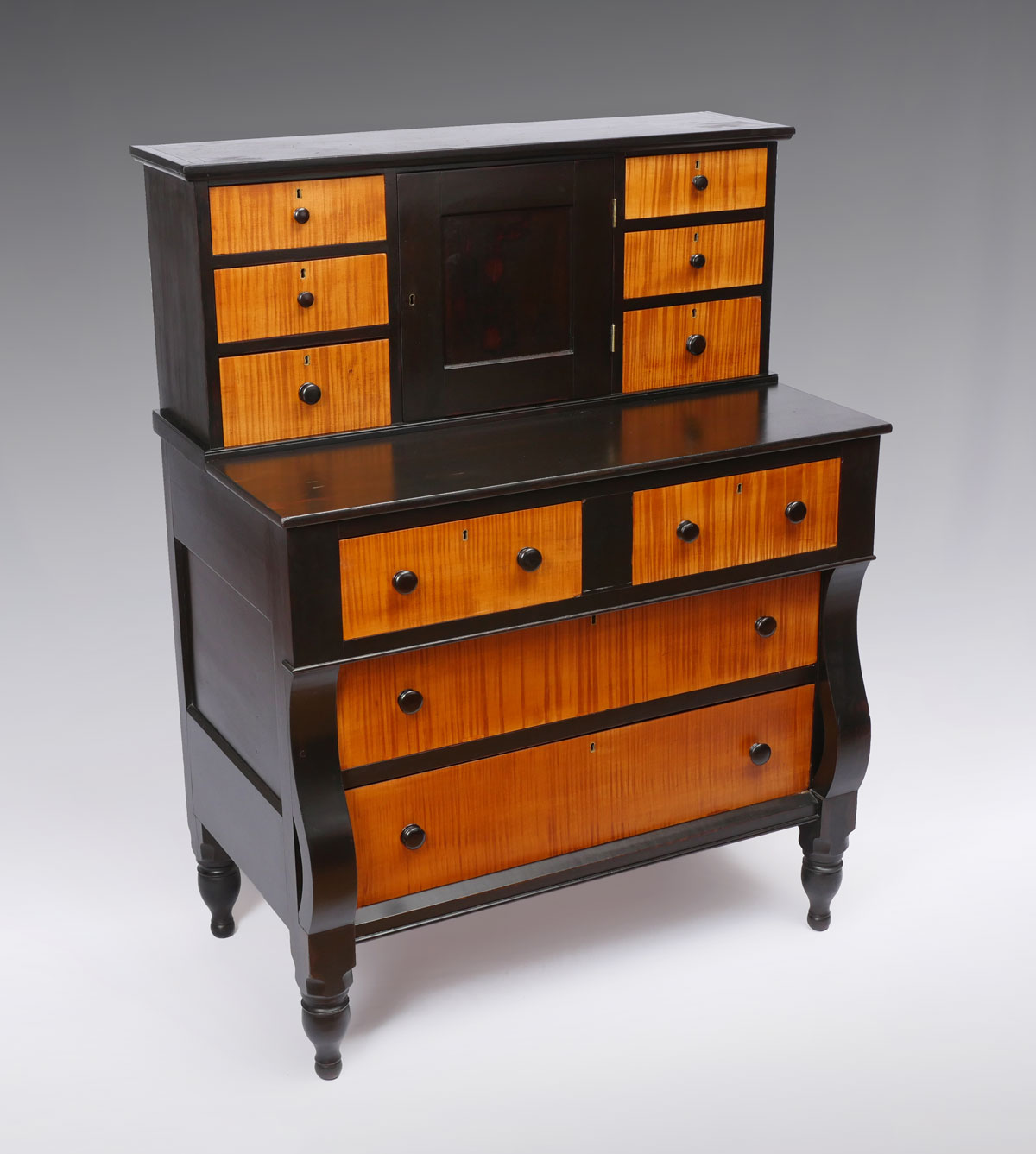 Appraisal: DRAWER EBONY AND TIGER MAPLE GENTLEMAN'S CHEST Ebonized wood case