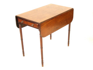 Appraisal: A Regency mahogany pembroke table the reeded rounded top above