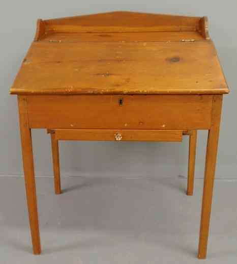 Appraisal: Pine slant-lid schoolmaster's desk with a small lower drawer h