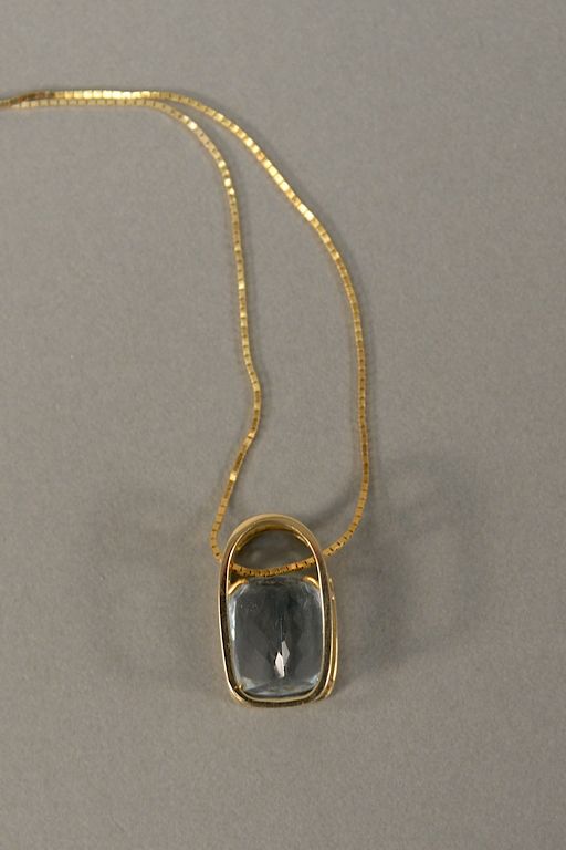 Appraisal: karat gold chain with pendant set with large aquamarine x