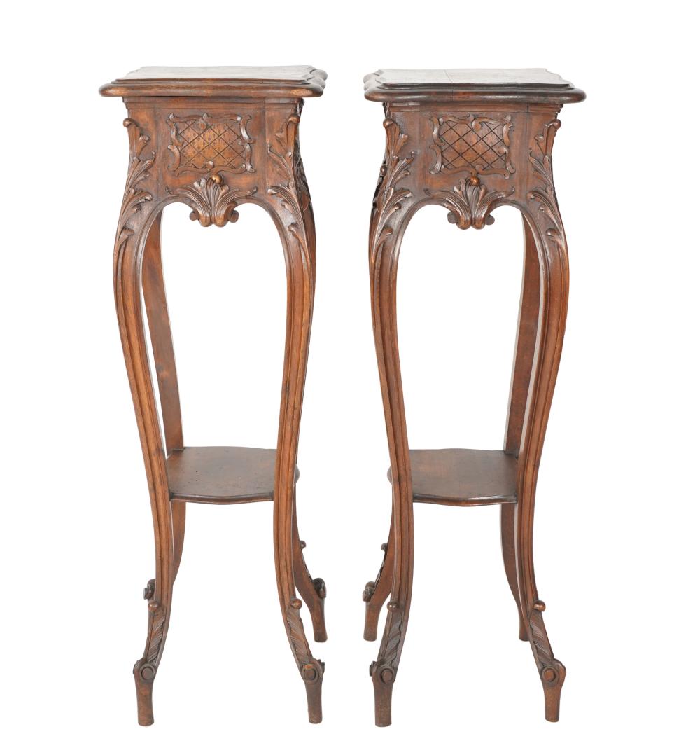 Appraisal: PAIR OF LOUIS XV PROVINCIAL-STYLE PLANT STANDScarved walnut Condition with