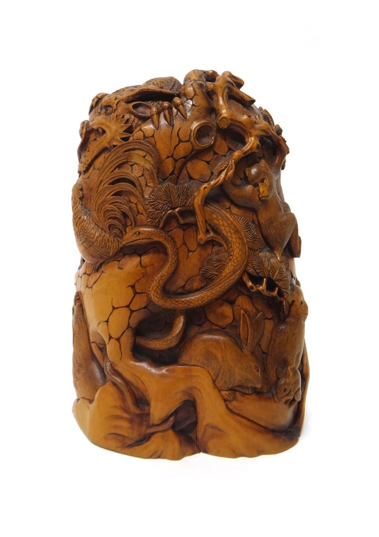 Appraisal: A Japanese wood okimono Meiji period carved with the animals