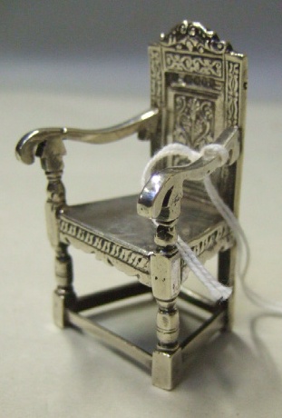 Appraisal: A silver miniature Wainscot armchair of th century design import