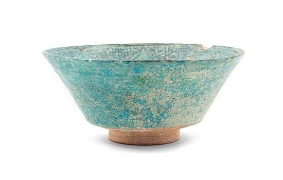 Appraisal: An Islamic Black and Blue Glazed Pottery Bowl Diameter inches