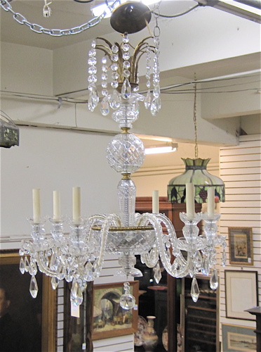 Appraisal: SIX-LIGHT CUT CRYSTAL CHANDELIER the corona and six candlestick lights