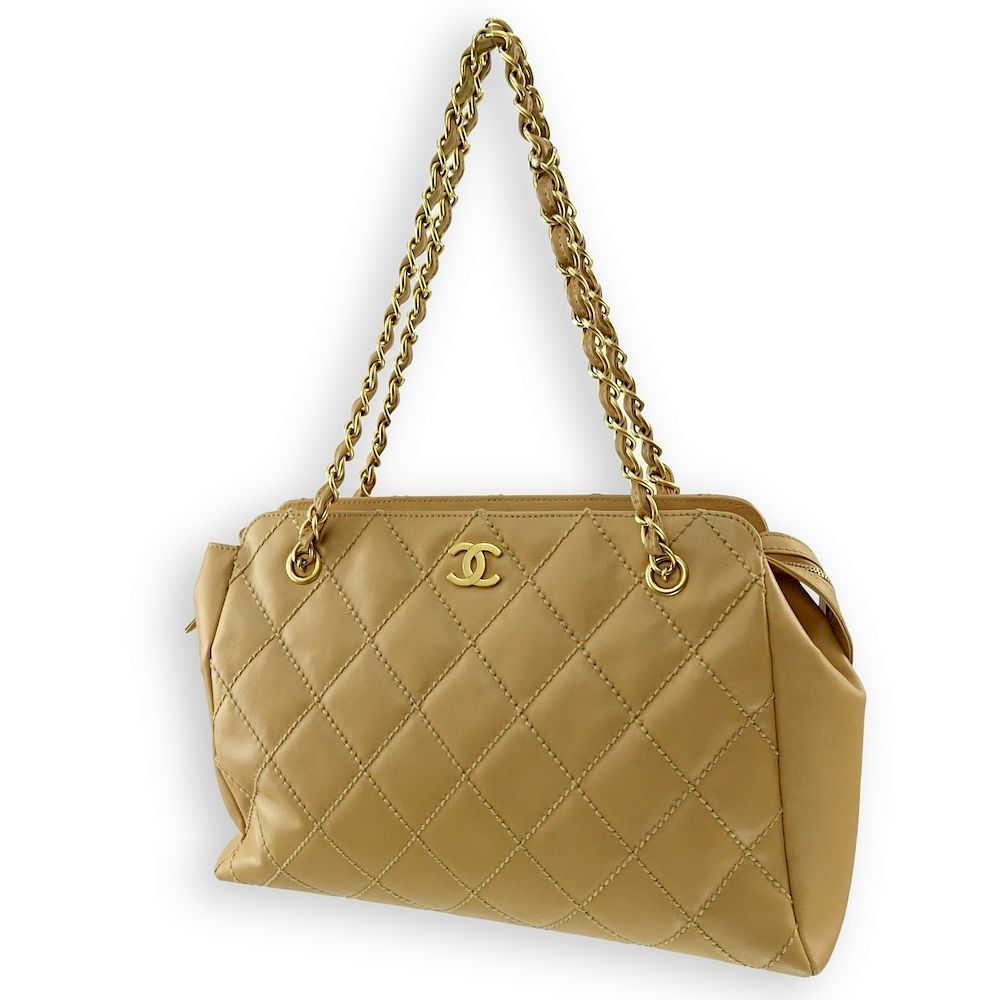 Appraisal: Chanel Beige Quilted Leather Zip Shopping Bag Chanel Beige Wild