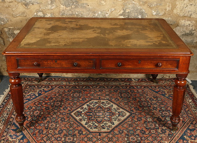 Appraisal: A VICTORIAN MAHOGANY DOUBLE SIDED LIBRARY TABLE with inset leather