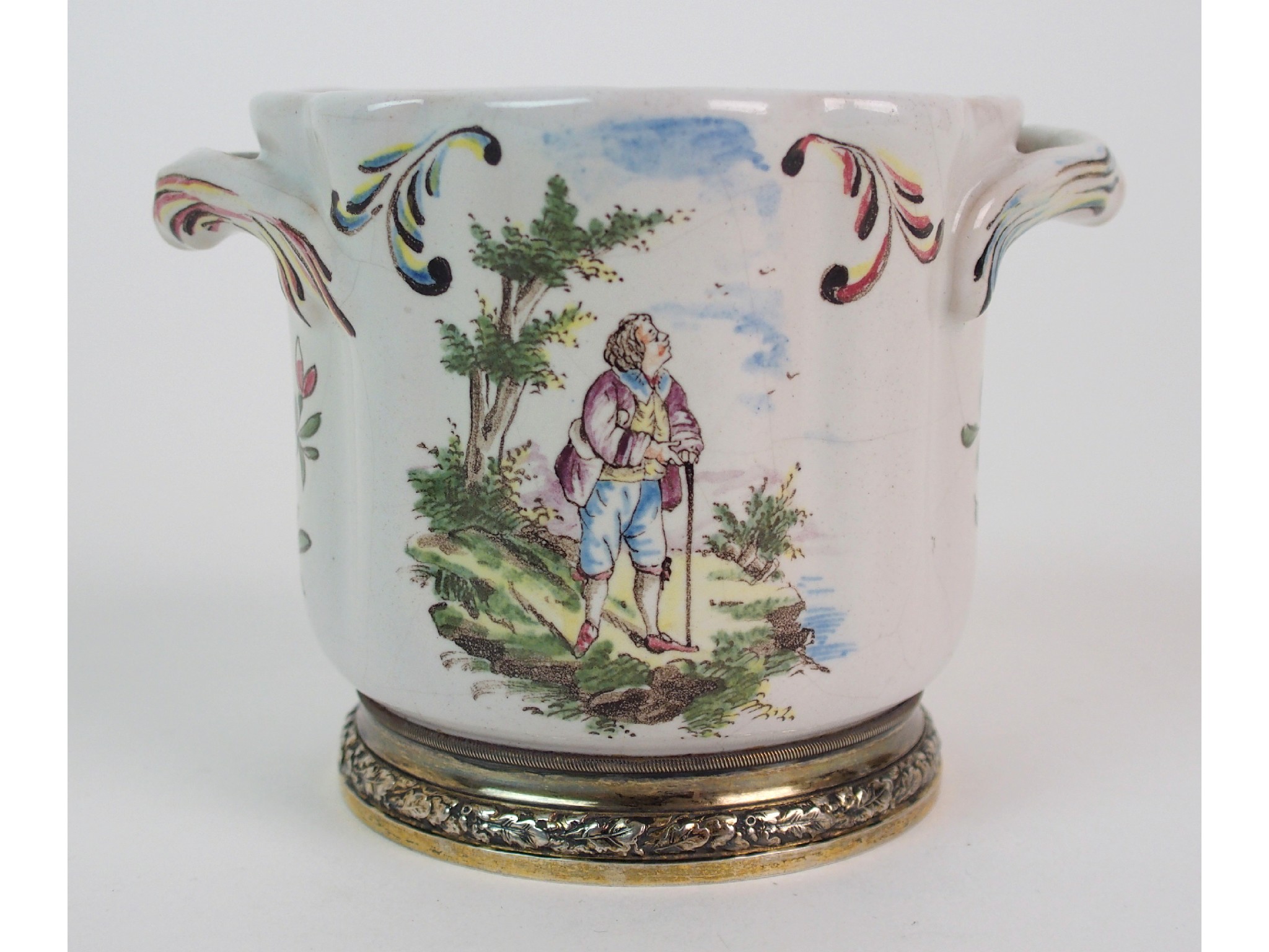 Appraisal: A French porcelain cache pot with silver gilt mountshaped cylindrical