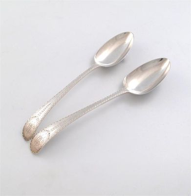 Appraisal: A pair of George III silver bright-cut tablespoons by James