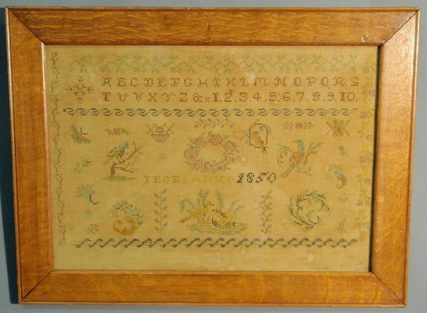 Appraisal: Oak framed silkwork sampler wrought by Fecelanno x