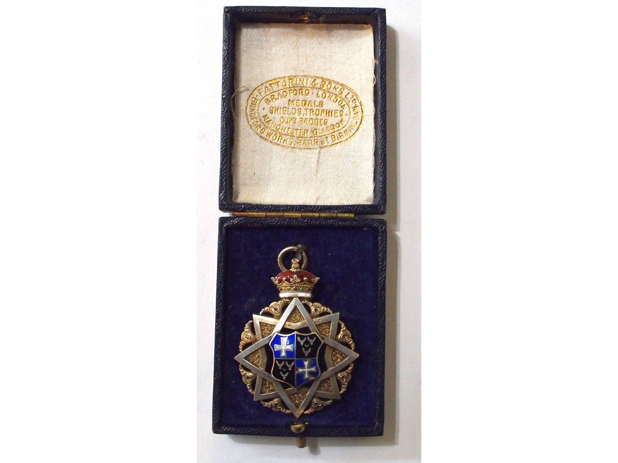 Appraisal: A silver and enamel medal by Spencer London possibly Masonic