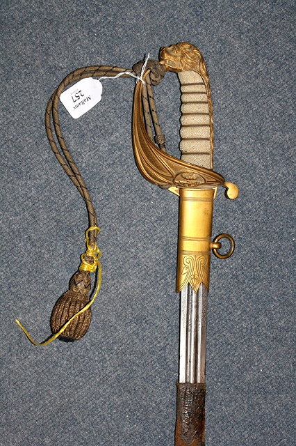 Appraisal: A ROYAL NAVY AUXILLARY RESERVE DRESS SWORD with lion head