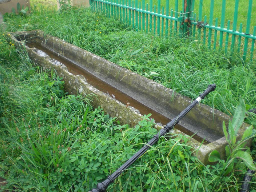 Appraisal: A long stone Trough ft approx long ft deep