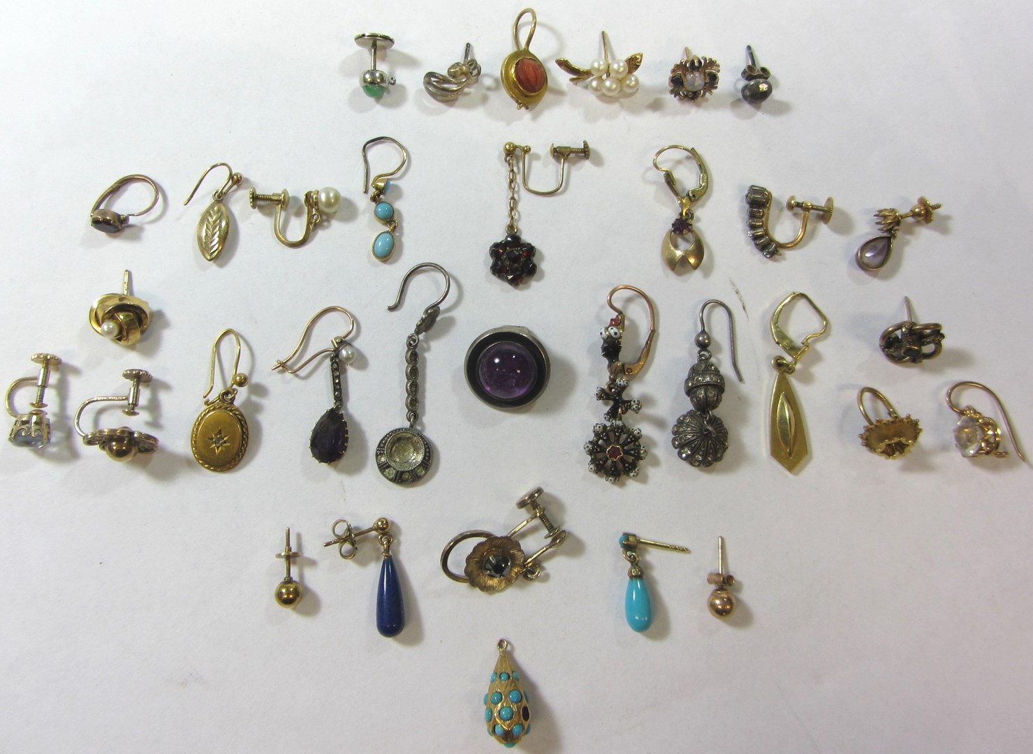 Appraisal: A group of thirty-three odd earrings including some gold and