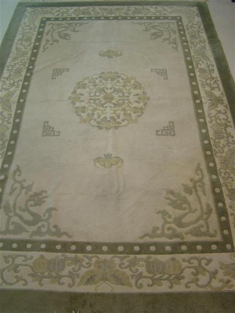 Appraisal: LARGE INDIAN GREEN AND CREAM RUG x INCHES