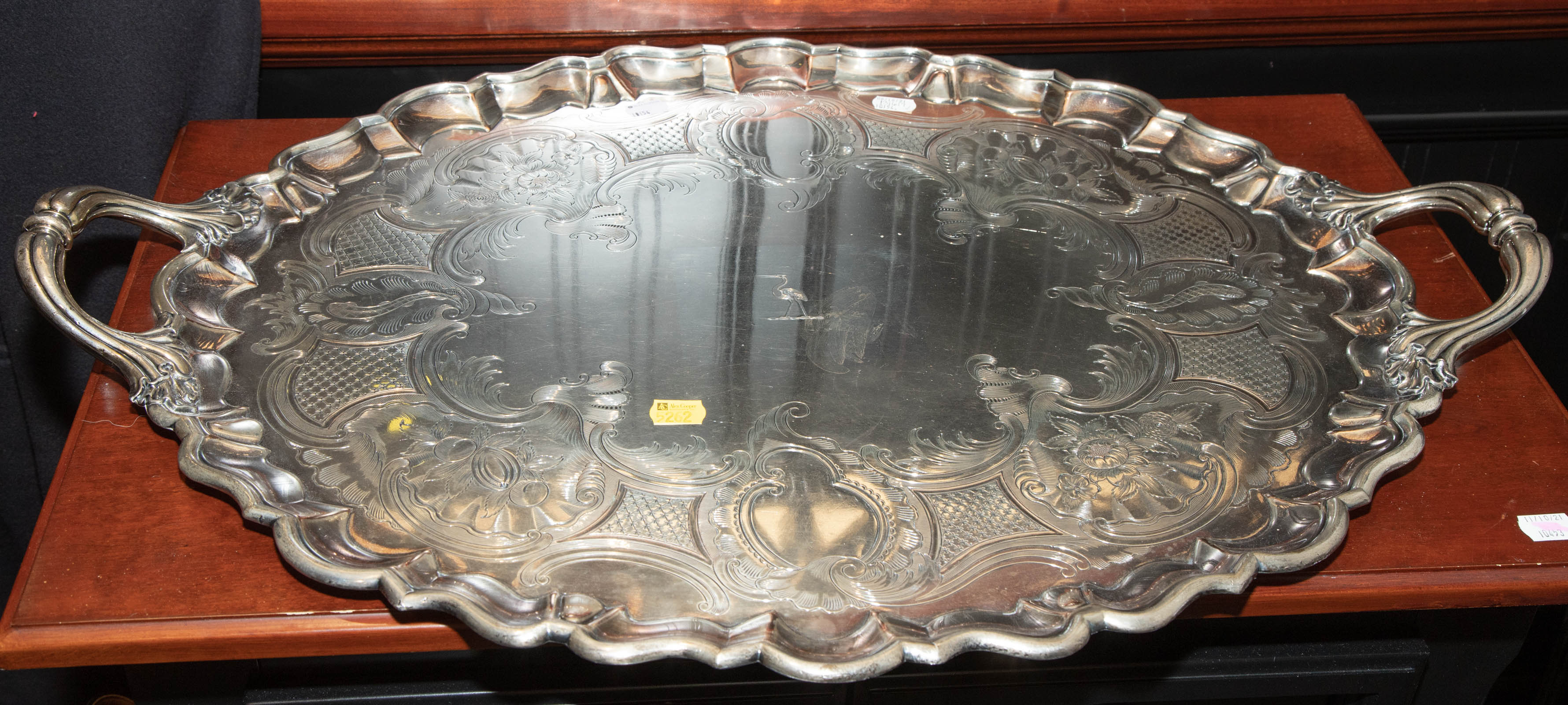 Appraisal: LARGE SILVER PLATED ARMORIAL SERVING TRAY Sheffield th century silver