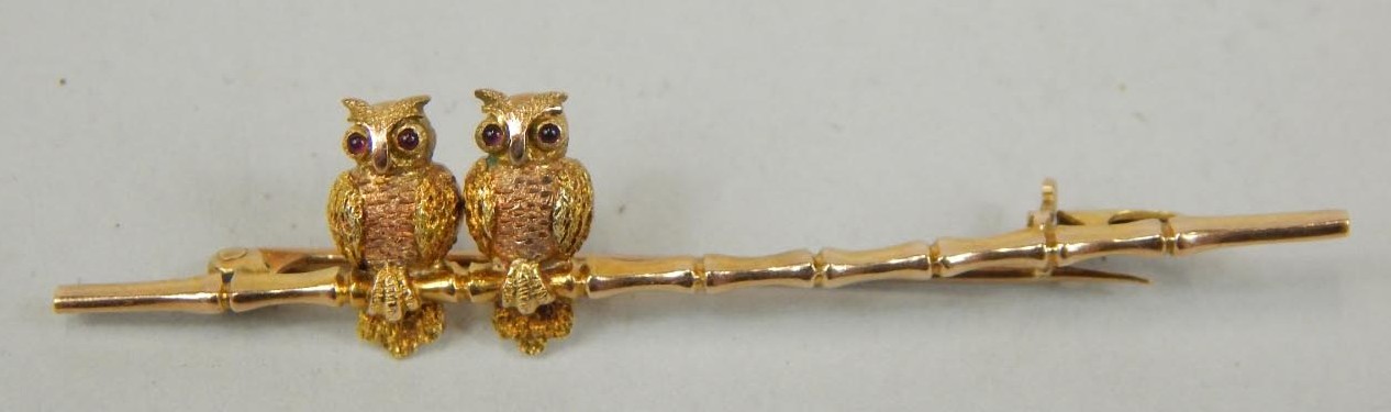 Appraisal: A bar brooch with two owls attached stamped ct