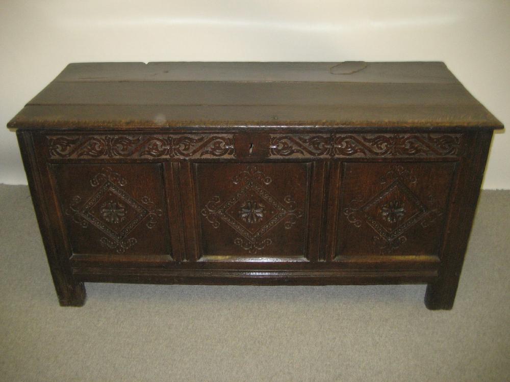 Appraisal: AN OAK PANELLED COFFER Yorkshire early th century the hinged