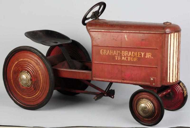 Appraisal: Pressed Steel Graham-Bradley Junior Pedal Tractor This is one of