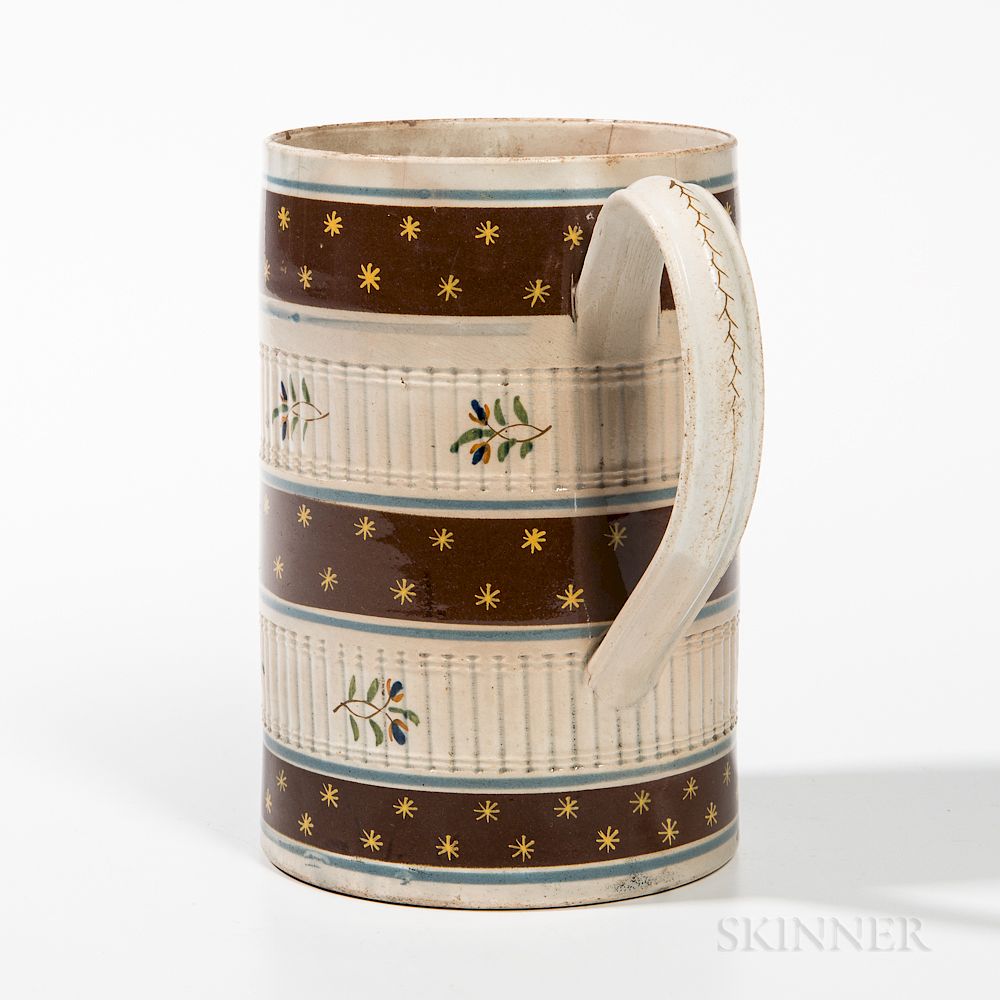 Appraisal: Mocha Quart Creamware Engine-turned Mug Mocha Quart Creamware Engine-turned Mug