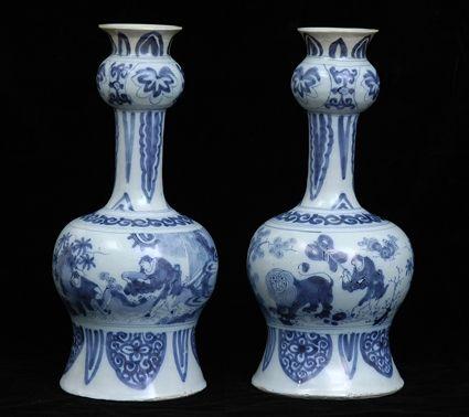 Appraisal: PAIR OF BLUE AND WHITE DELFT VASES Each baluster-form bowl