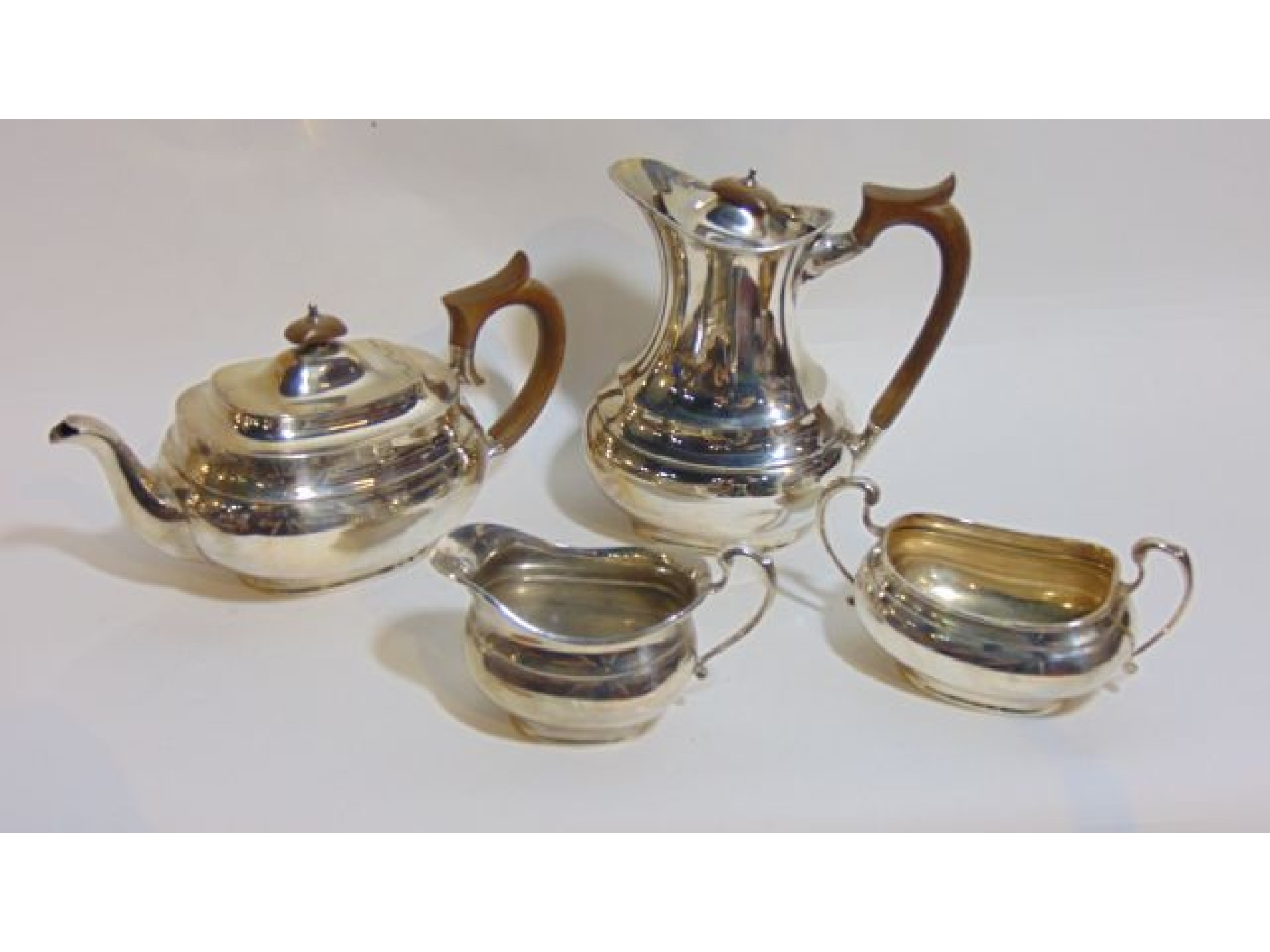 Appraisal: A four-piece Edwardian silver tea set probably Sydney Hall Co