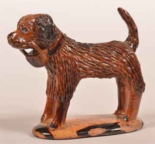 Appraisal: Glazed Redware Pottery Figure of a Dog Glazed Redware Pottery