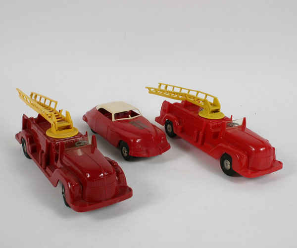 Appraisal: Marx friction toys two ladder trucks and chief's car Longest